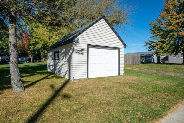 garage with a lawn