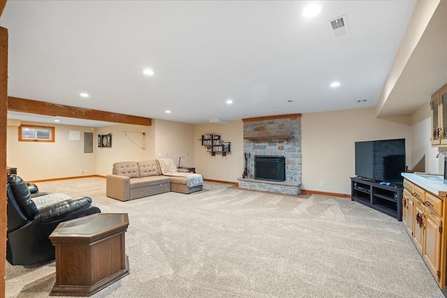 carpeted living room featuring electric panel and a fireplace