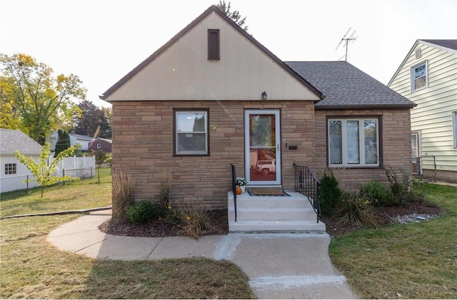 bungalow with a front yard