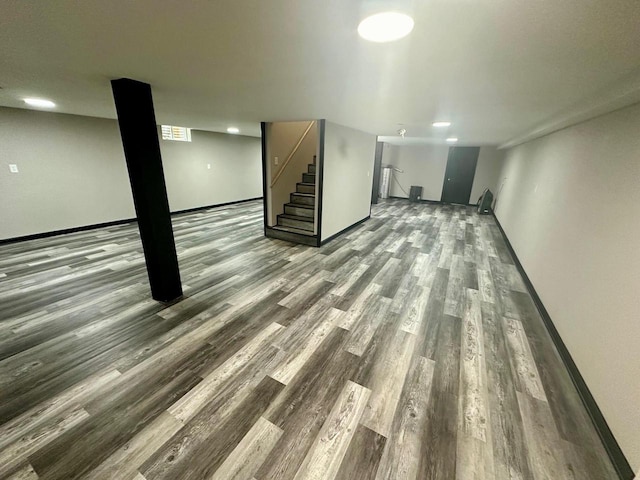 basement with wood-type flooring