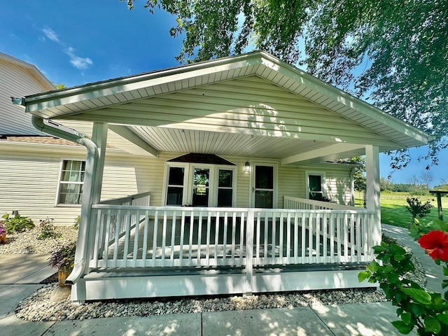 back of house with a porch