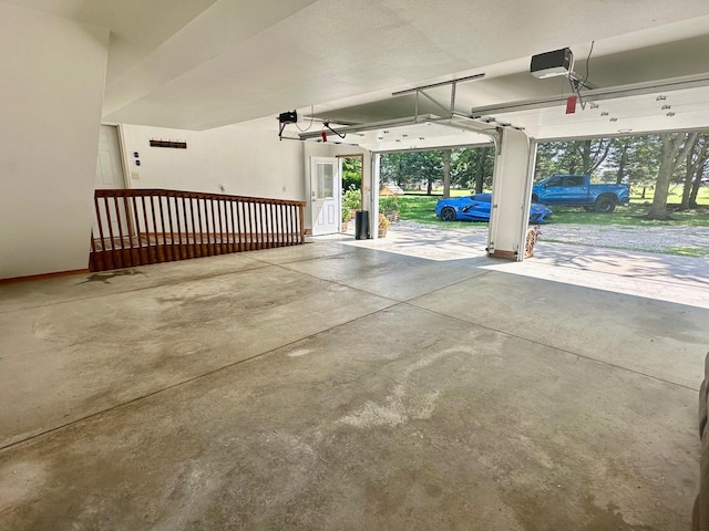 garage featuring a carport