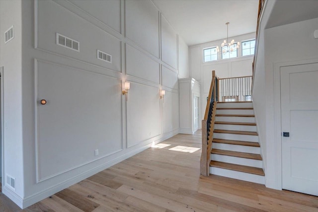 1438 Greenleaf Ct, Sun Prairie, WI 53590 - staircase with a decorative wall and visible vents