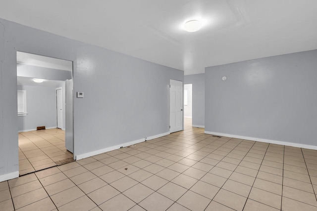 view of tiled spare room