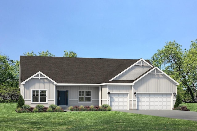 view of front facade featuring a garage, aphalt driveway, a front lawn, and a shingled roof