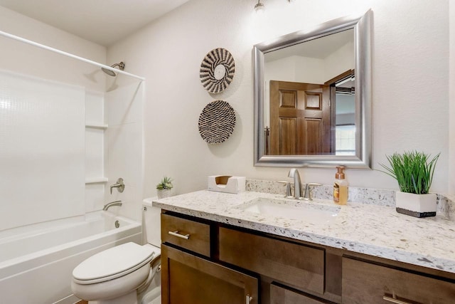 full bathroom with shower / bathing tub combination, toilet, and vanity