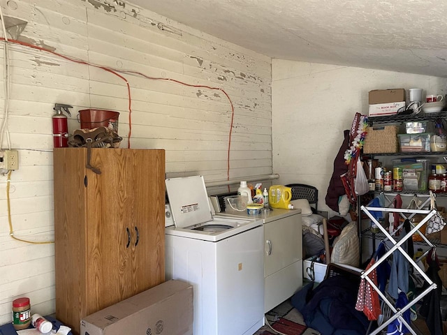 washroom featuring washing machine and dryer