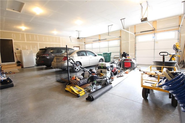 garage featuring a garage door opener