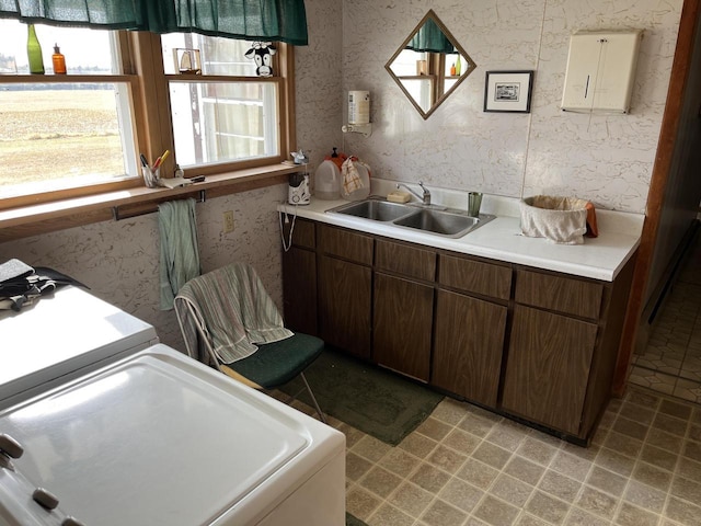 W6011 Pike River Rd, Wausaukee, WI 54177 - kitchen featuring a sink, plenty of natural light, light countertops, and wallpapered walls