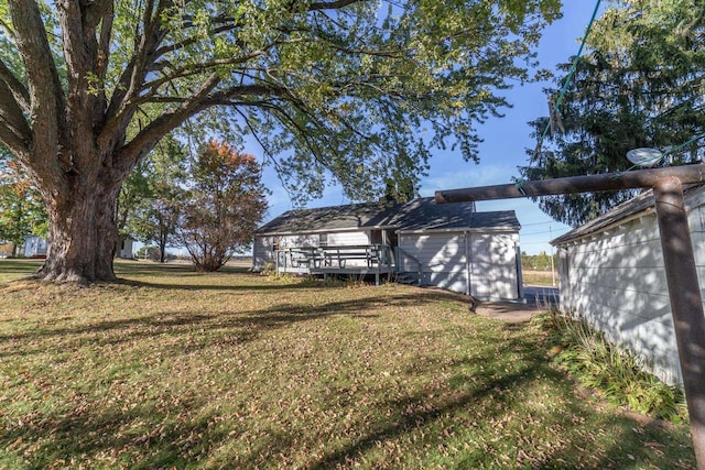 view of yard featuring a deck