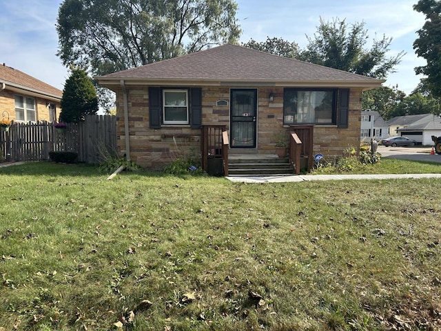 view of front of property featuring a front yard