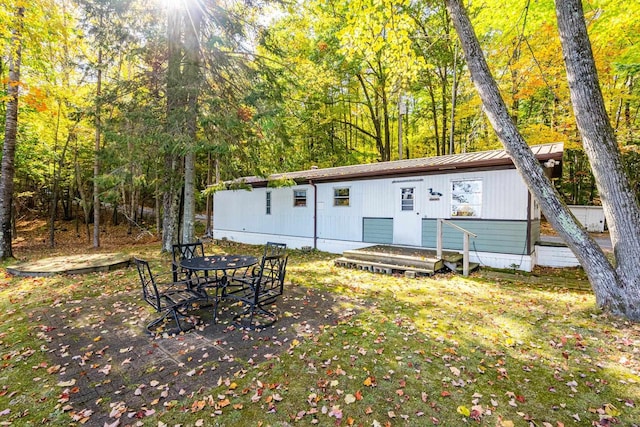 back of house featuring a patio area