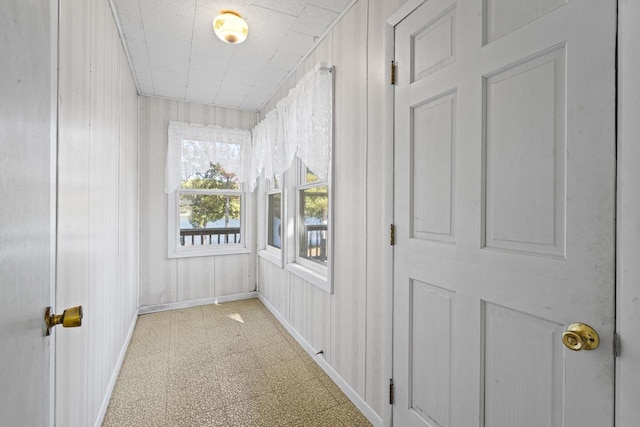 corridor with wood walls