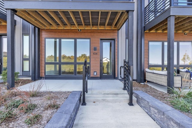 entrance to property featuring a patio