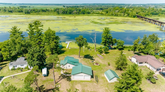 drone / aerial view featuring a rural view and a water view