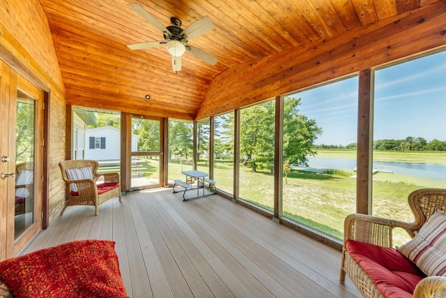 sunroom featuring ceiling fan, vaulted ceiling, a water view, and wooden ceiling