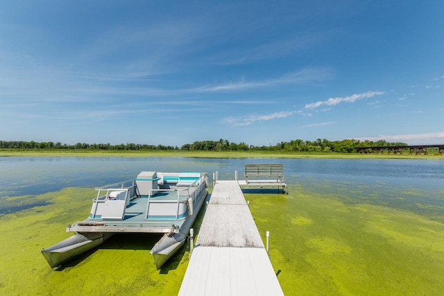 view of dock with a water view