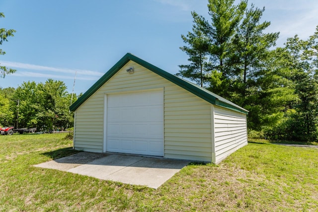 garage with a lawn