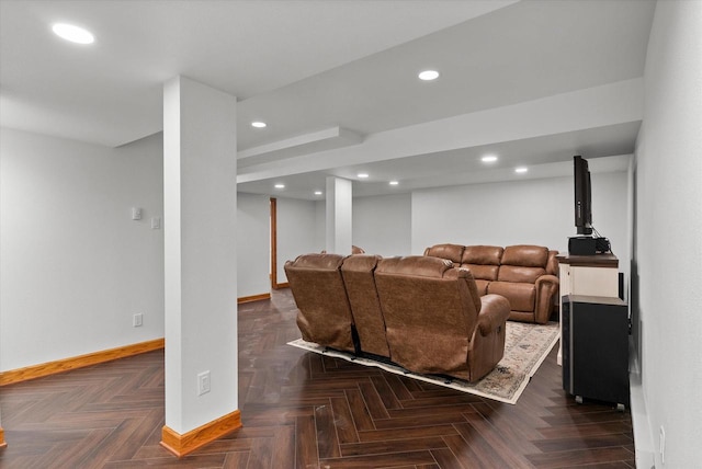 living room featuring dark parquet floors