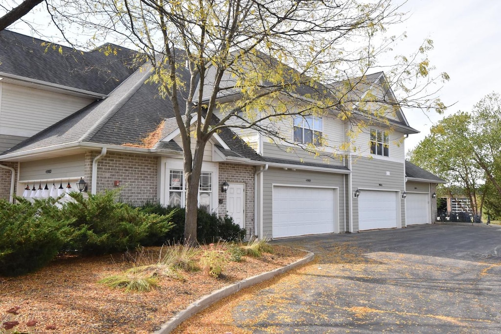 front of property featuring a garage