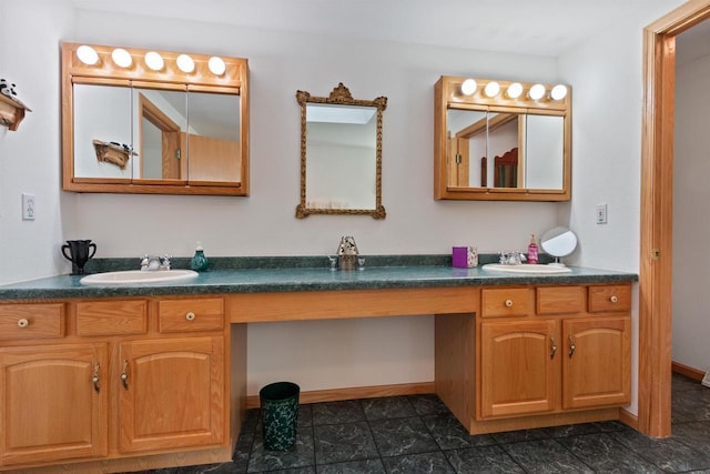 331 Robindale Ct, Nekoosa, WI 54457 - bathroom featuring vanity and baseboards