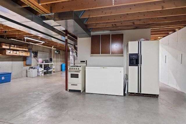 basement with fridge and white fridge with ice dispenser