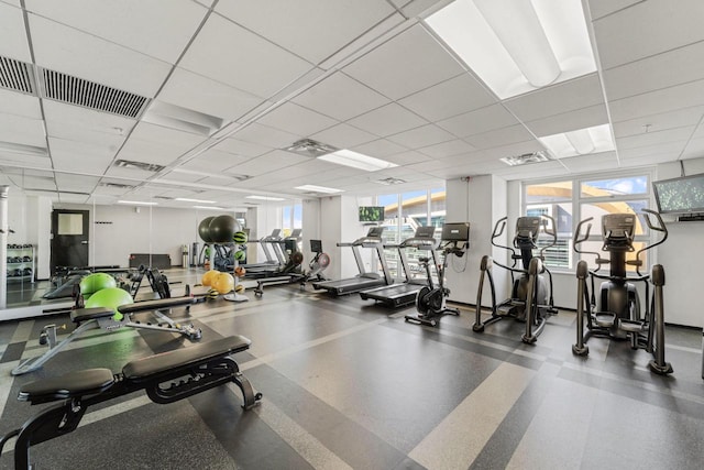 workout area with a drop ceiling