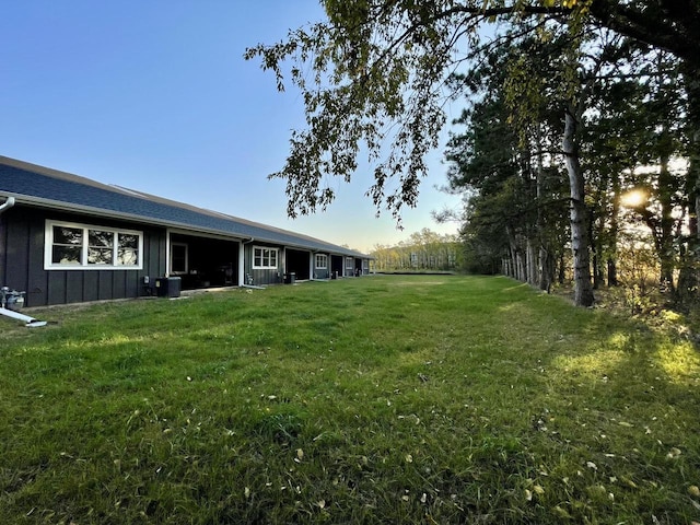 view of yard featuring central AC