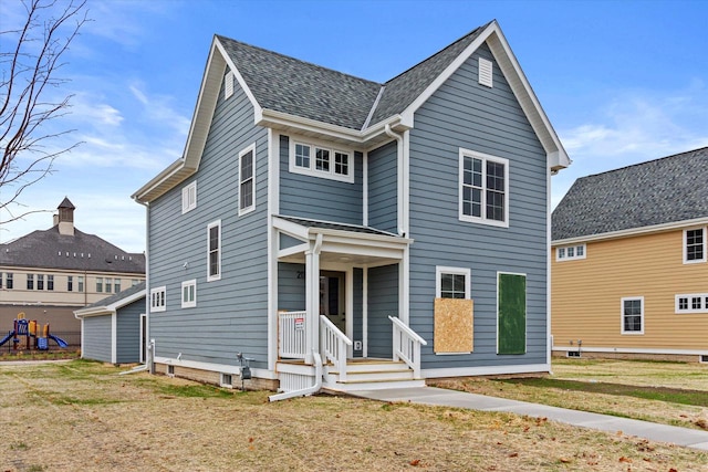 view of front of property with a front lawn