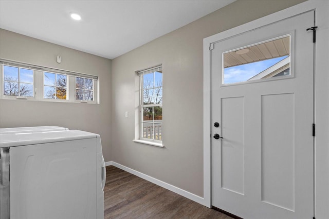 laundry area featuring plenty of natural light and dark wood-type flooring