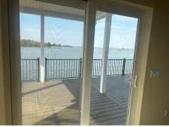 doorway to outside featuring a water view