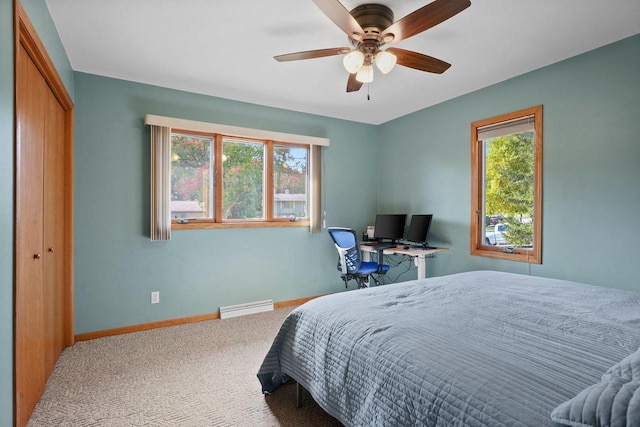 bedroom with a closet, carpet flooring, and ceiling fan