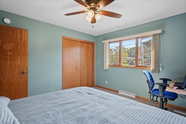 carpeted bedroom featuring a closet and ceiling fan