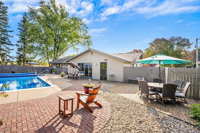 view of pool with a deck