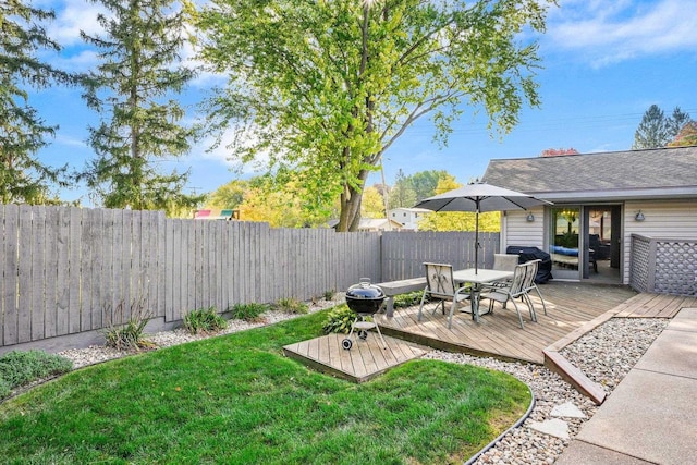 view of yard featuring a wooden deck