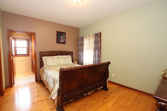 bedroom with light hardwood / wood-style floors