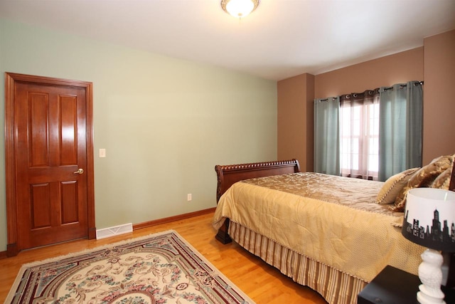 bedroom featuring light wood-type flooring