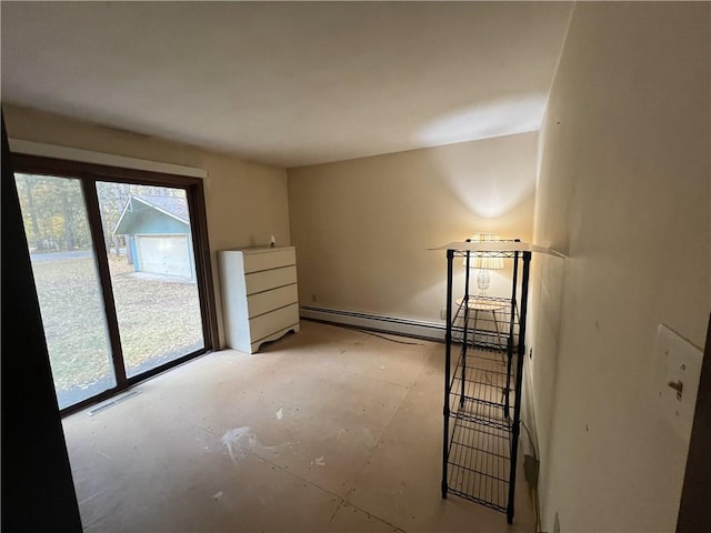 empty room featuring a baseboard radiator