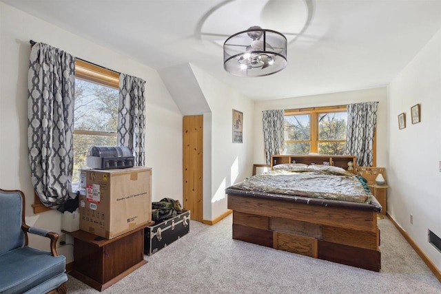 bedroom with light carpet