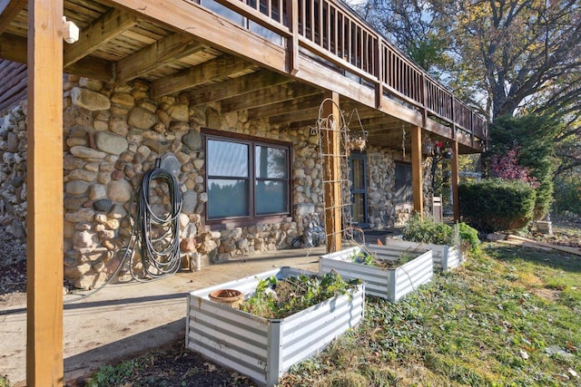 exterior space featuring a wooden deck