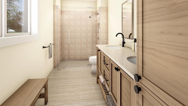 bathroom featuring vanity, toilet, and tiled shower