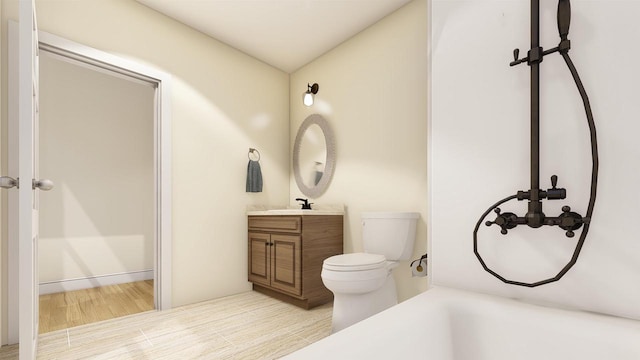 bathroom with hardwood / wood-style flooring, toilet, and vanity