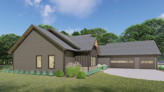 view of front facade with a front yard and a garage