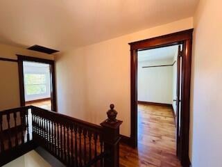 corridor featuring hardwood / wood-style flooring