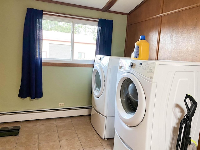 washroom featuring washer and clothes dryer, a baseboard radiator, and light tile patterned floors