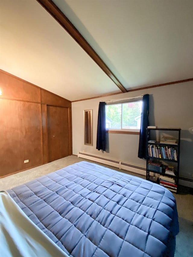 carpeted bedroom featuring vaulted ceiling with beams and a baseboard radiator