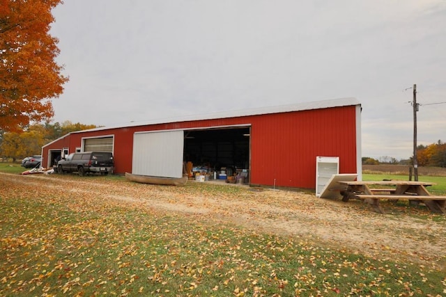 N8709 5th Ave, Camp Douglas, WI 54618 - view of pole building with driveway