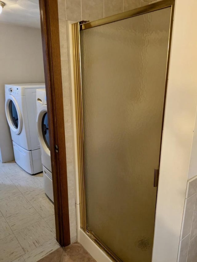 N8709 5th Ave, Camp Douglas, WI 54618 - full bath featuring a stall shower and washing machine and dryer