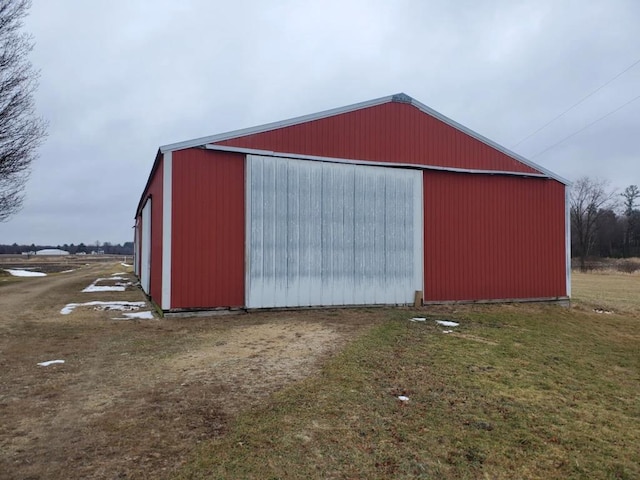 N8709 5th Ave, Camp Douglas, WI 54618 - view of pole building featuring a lawn