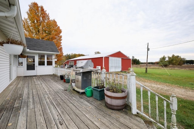 N8709 5th Ave, Camp Douglas, WI 54618 - wooden deck with a lawn and an outdoor structure